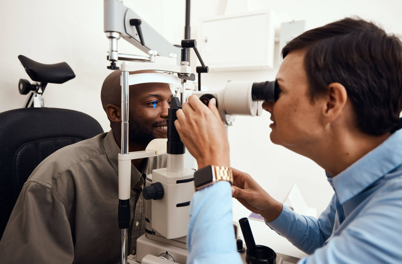 a man has his first eye exam in years at the optometrist