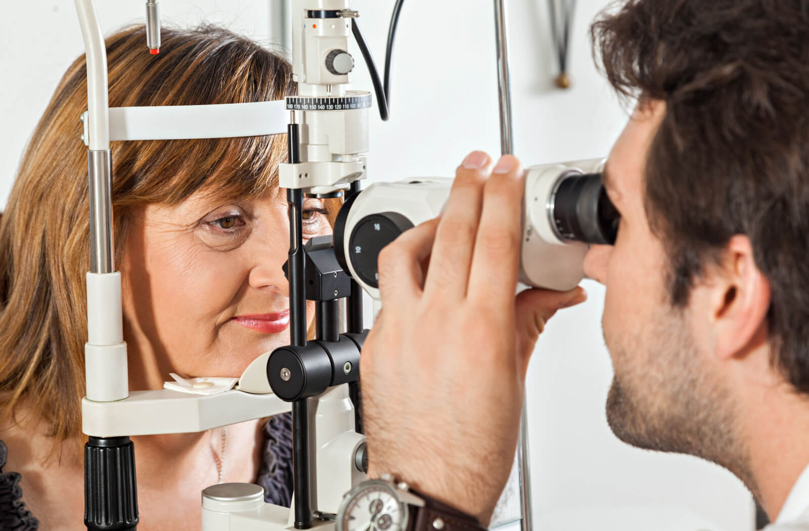 Middle-aged woman undergoing an eye exam